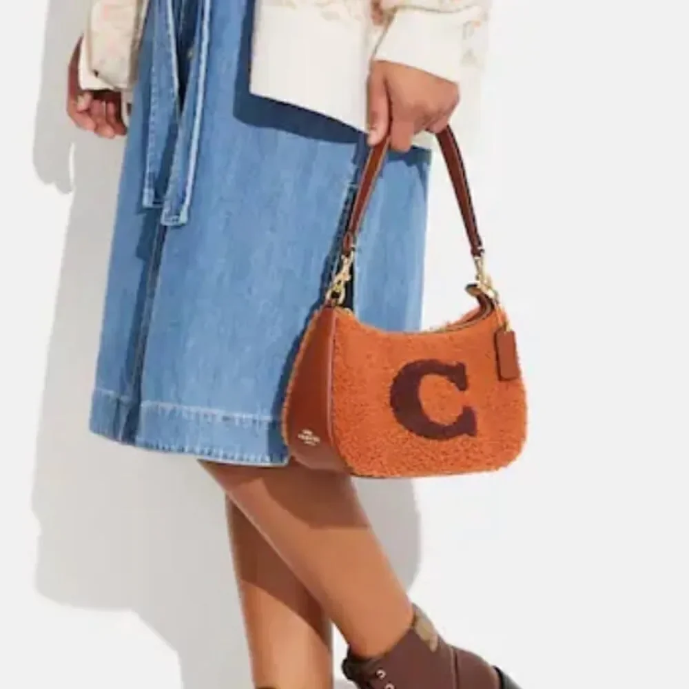 NWT Coach GENUINE SHEARLING teri shoulder bag with coach motif NEW WITH TAG​…